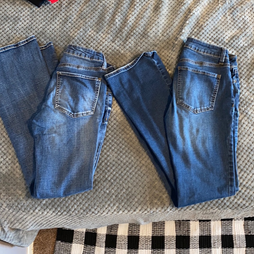 Two pairs of boot cut jeans